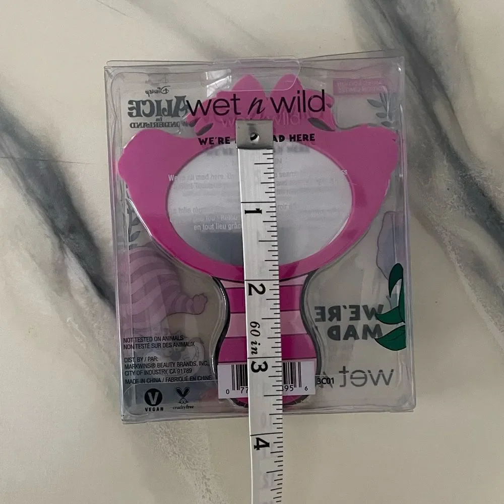 Wet n Wild Alice in Wonderland We're All Mad Here Hand Mirror
